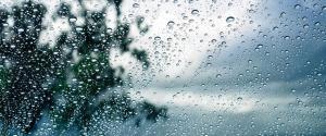 view from inside a window during heavy rainstorm